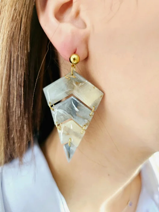 boucles d'oreilles Iskal portées